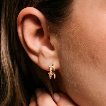 Sparv &Oslash;reringe til Dame udf&oslash;rt i Messing i en flot Guld farve