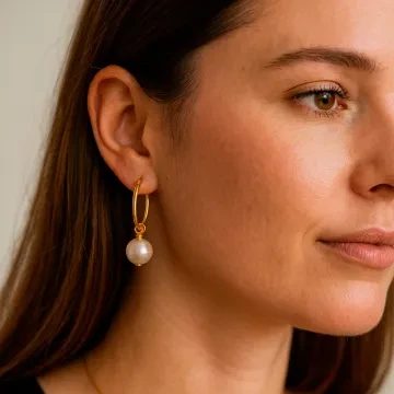 Susanne Friis Bjørner Øreringe til Dame udført i 925 Sterling Sølv i en flot Guld farve