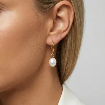 Schultz Øreringe til Dame udført i Cobber, Guld i en flot Guld farve