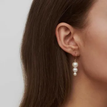 Julie Sandlau Ørering Single til Dame udført i Guld i en flot  farve